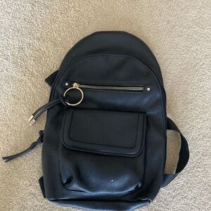 Dolce Vita Black Leather Crossbody Backpack with Gold Accents